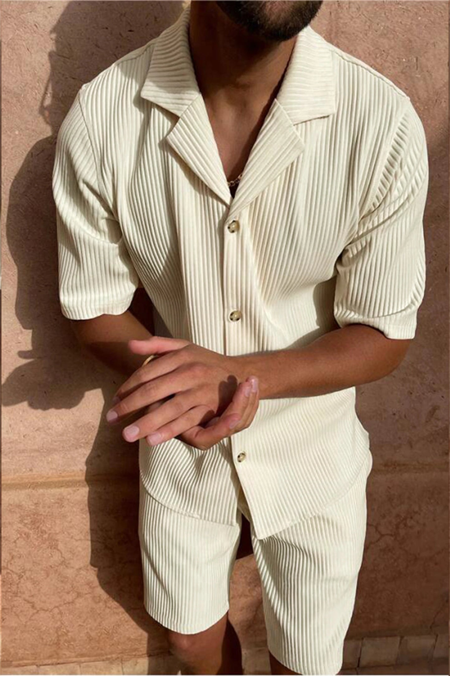 Spring/Summer Ensemble: Solid corduroy short-sleeve shirt and matching shorts, great for casual beach wear.