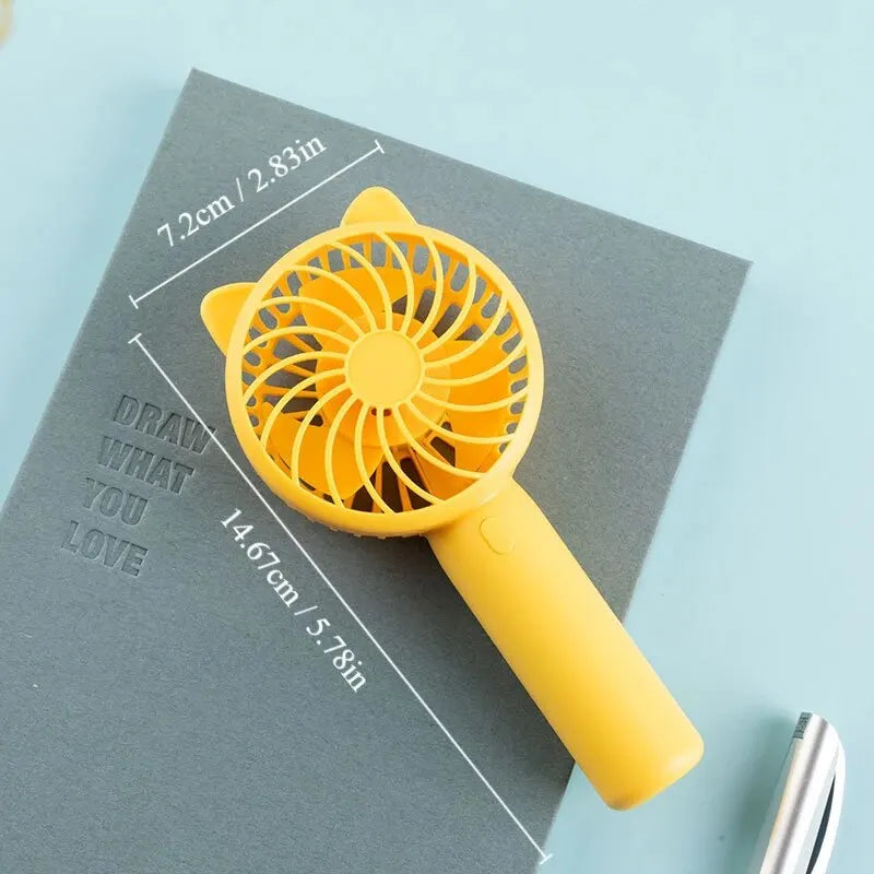 Portable Mini Handheld Fan – Battery Operated Cooling for Travel, Camping, Office, and Outdoor Use