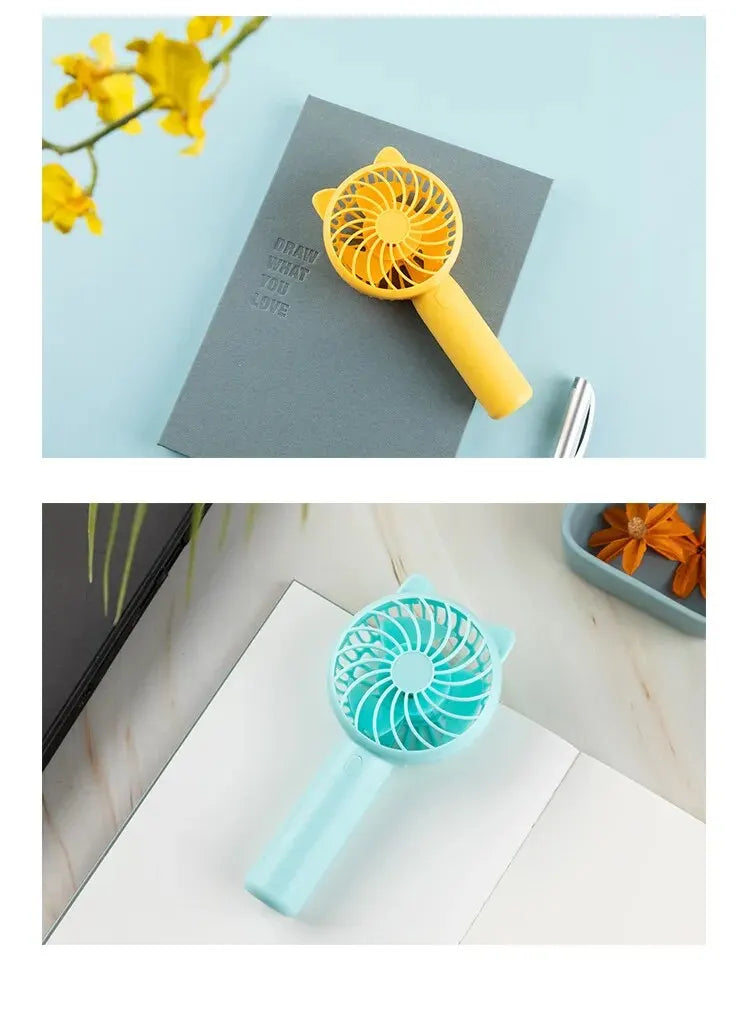 Portable Mini Handheld Fan – Battery Operated Cooling for Travel, Camping, Office, and Outdoor Use