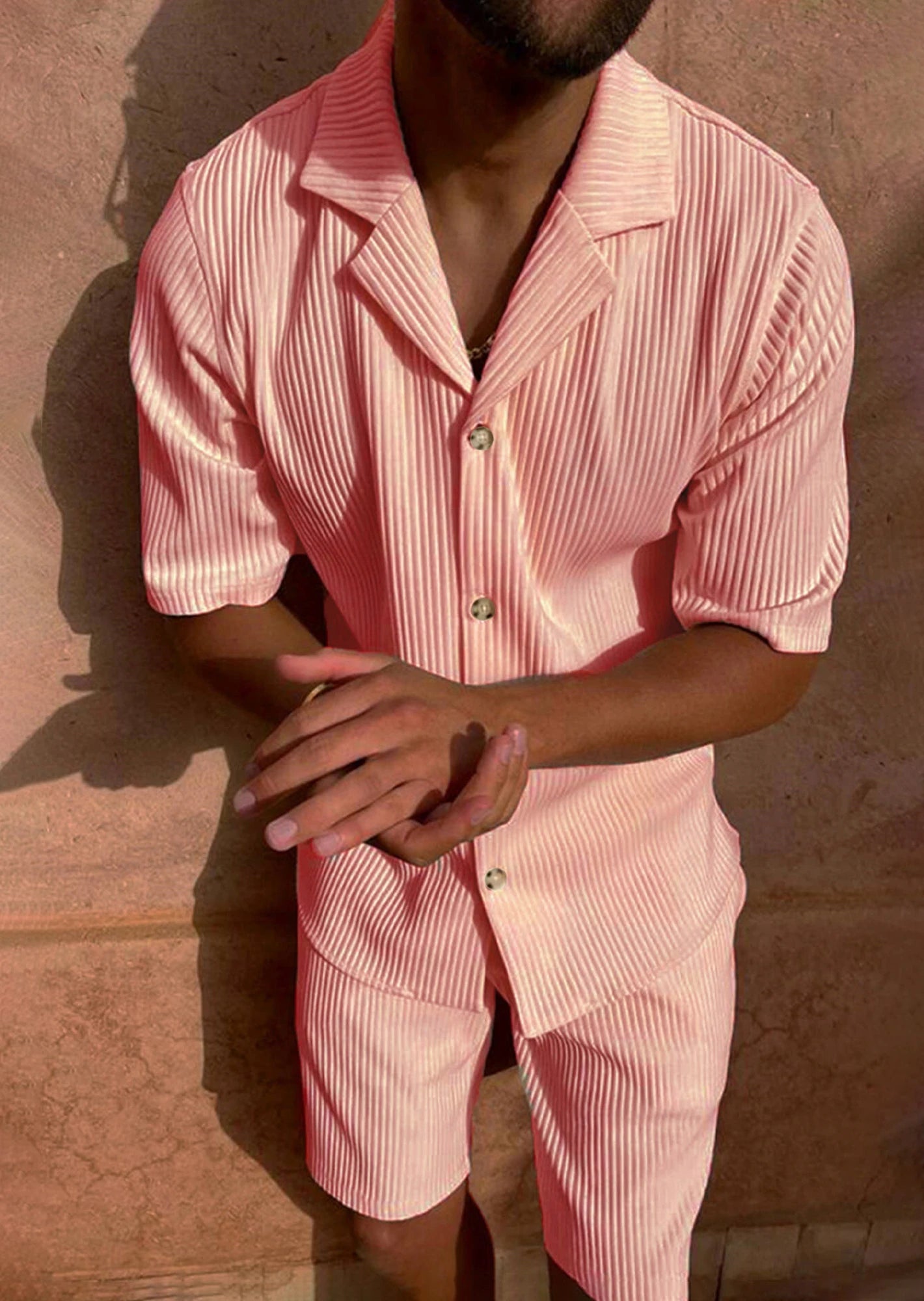 Spring/Summer Ensemble: Solid corduroy short-sleeve shirt and matching shorts, great for casual beach wear.