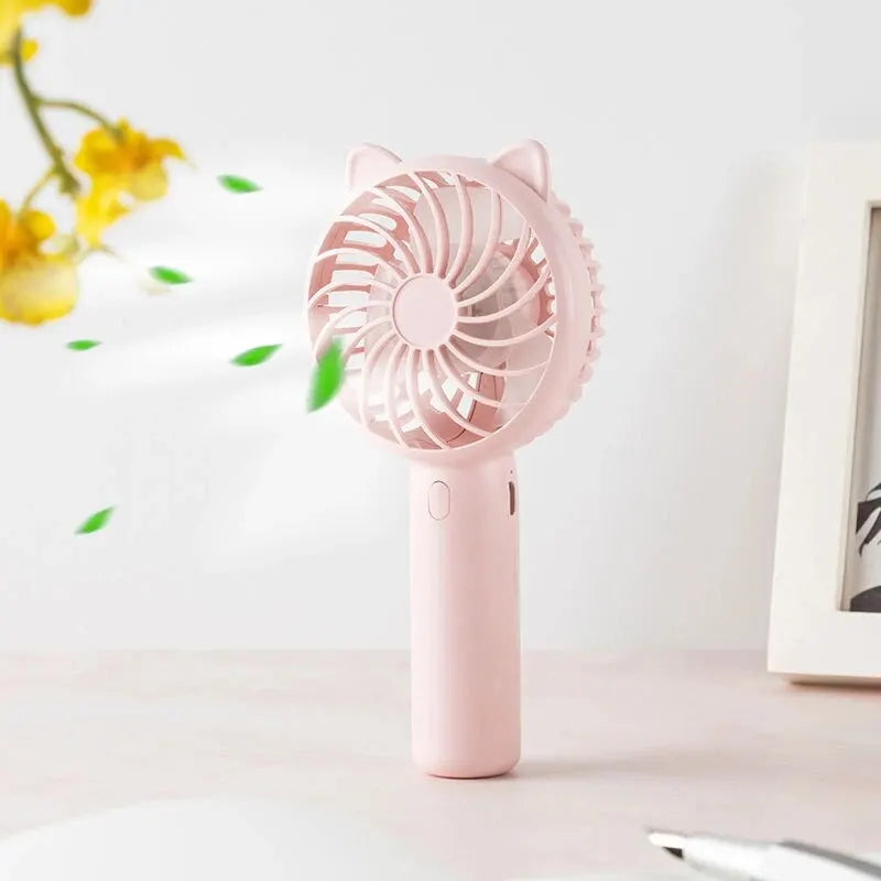 Portable Mini Handheld Fan – Battery Operated Cooling for Travel, Camping, Office, and Outdoor Use